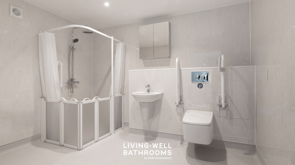 Wet room with half height screen and shower curtain. raised height toilet, sink. 