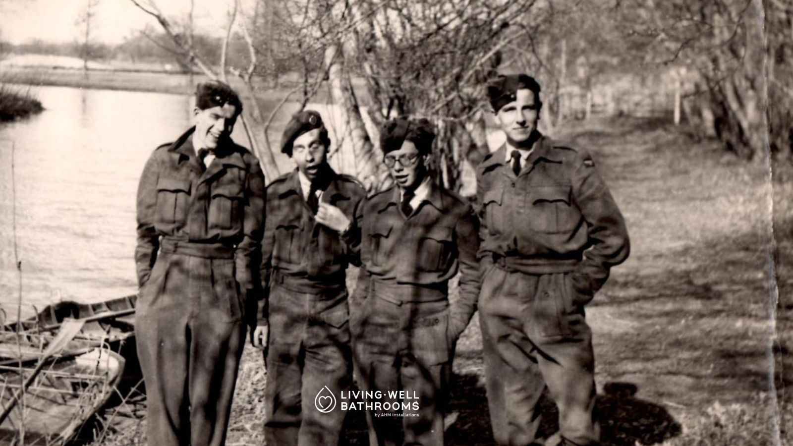 black and white image of four men in army uniform dating back to the 1940's